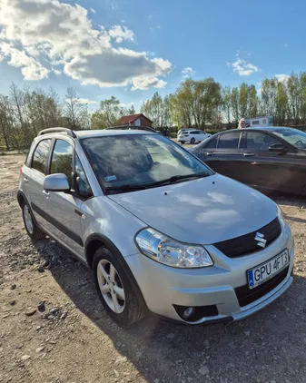 samochody osobowe Suzuki SX4 cena 24000 przebieg: 97300, rok produkcji 2009 z Tychy